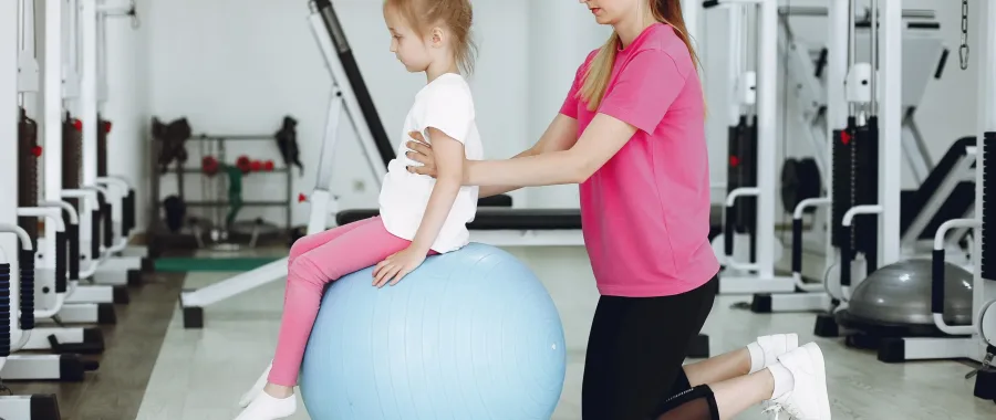 mother-with-little-daughter-are-engaged-gymnastics-gym